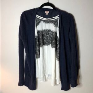Blue cardigan with tear near neck on back